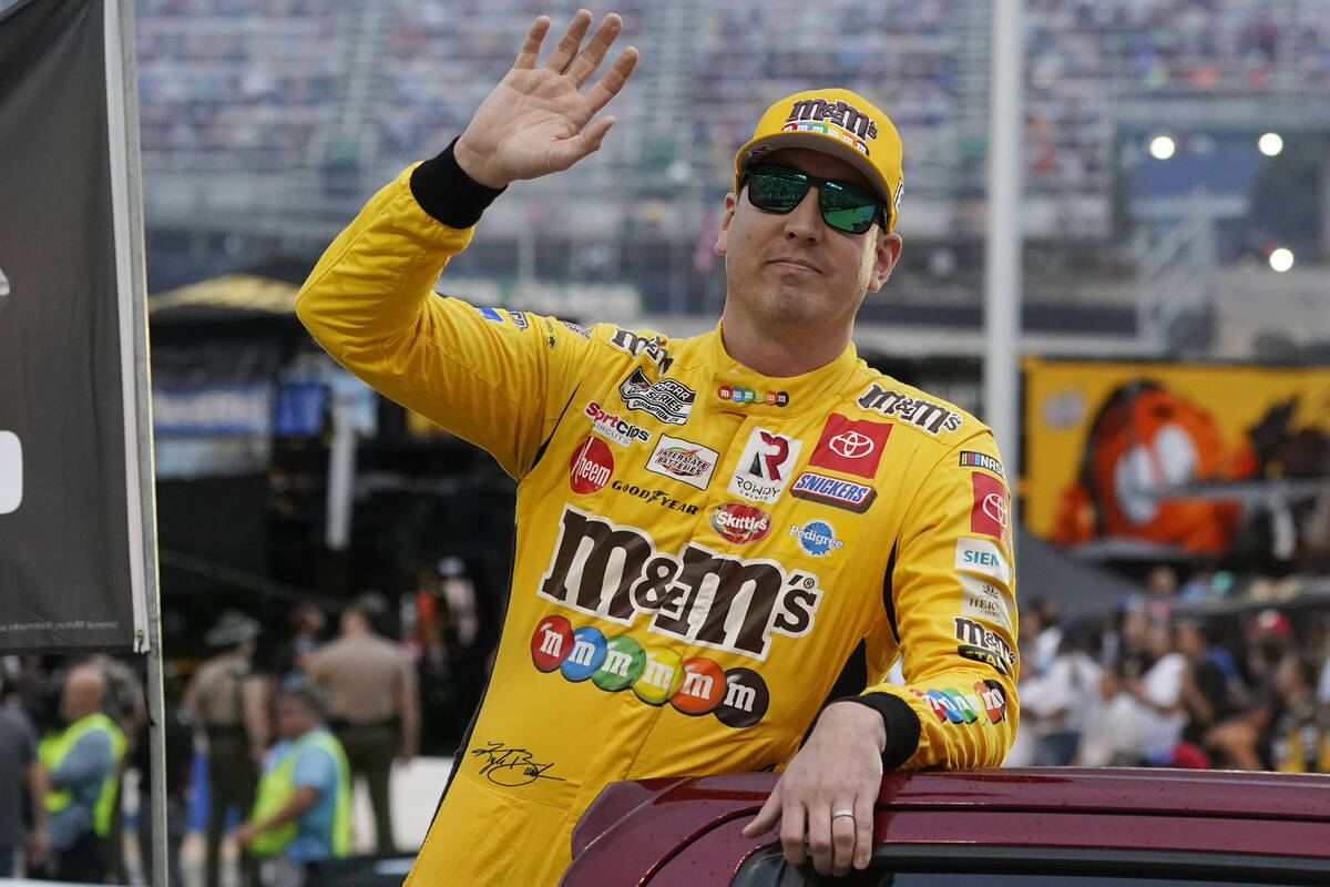 Kyle Busch waves to fans before a NASCAR Cup Series auto race at Bristol Motor Speedway Saturda ...