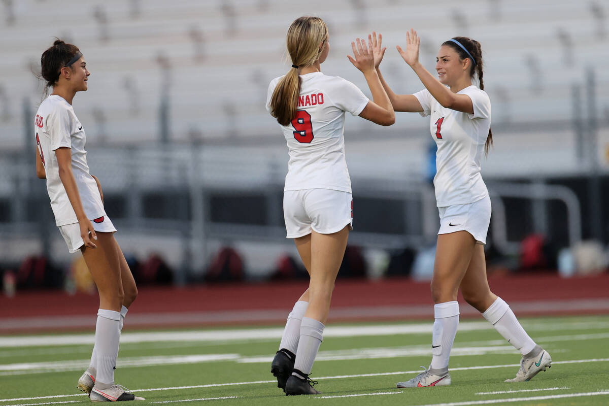 Coronado's Alexis Pashales (7) celebrates her goal with Molly Russell (9) during the second hal ...