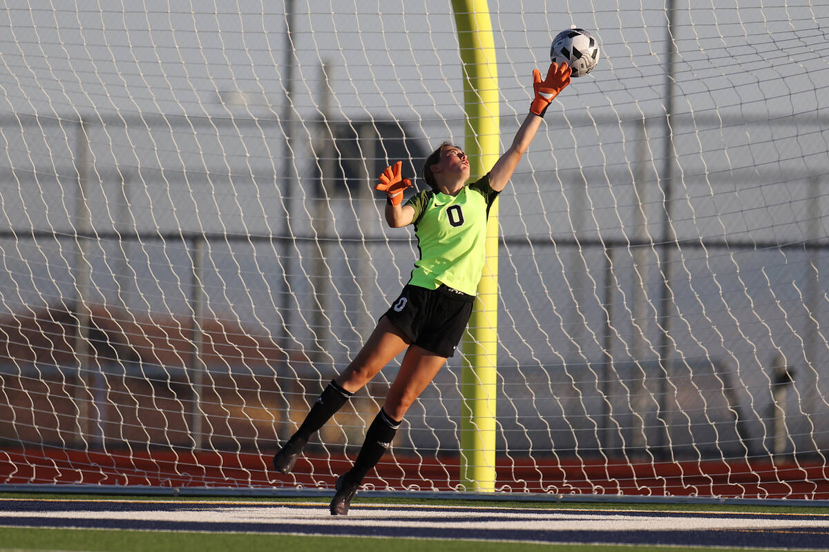 Coronado's Megan Kingman (0) makes a stop during the first half of a girl's soccer game against ...