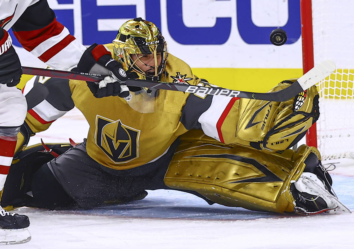 Golden Knights goaltender Marc-Andre Fleury (29) blocks the puck in front of Arizona Coyotes le ...