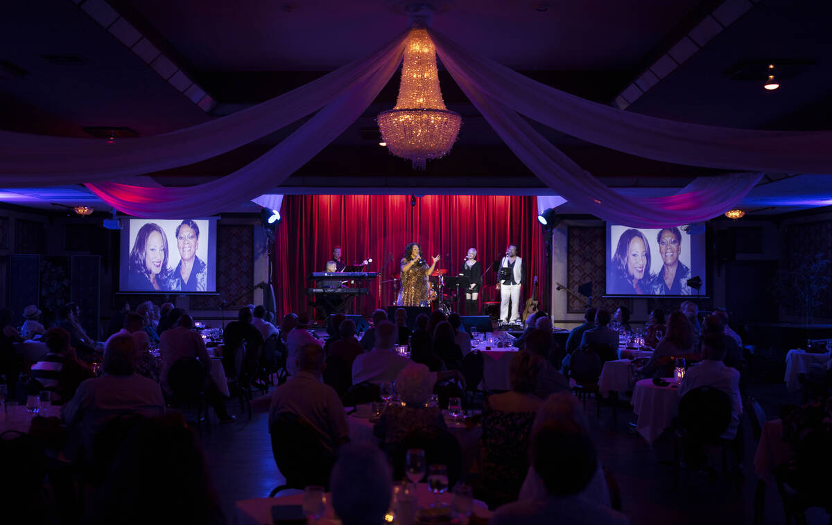 Michelle Johnson, middle, known as “Las Vegas' First Lady of Jazz,” performs at t ...