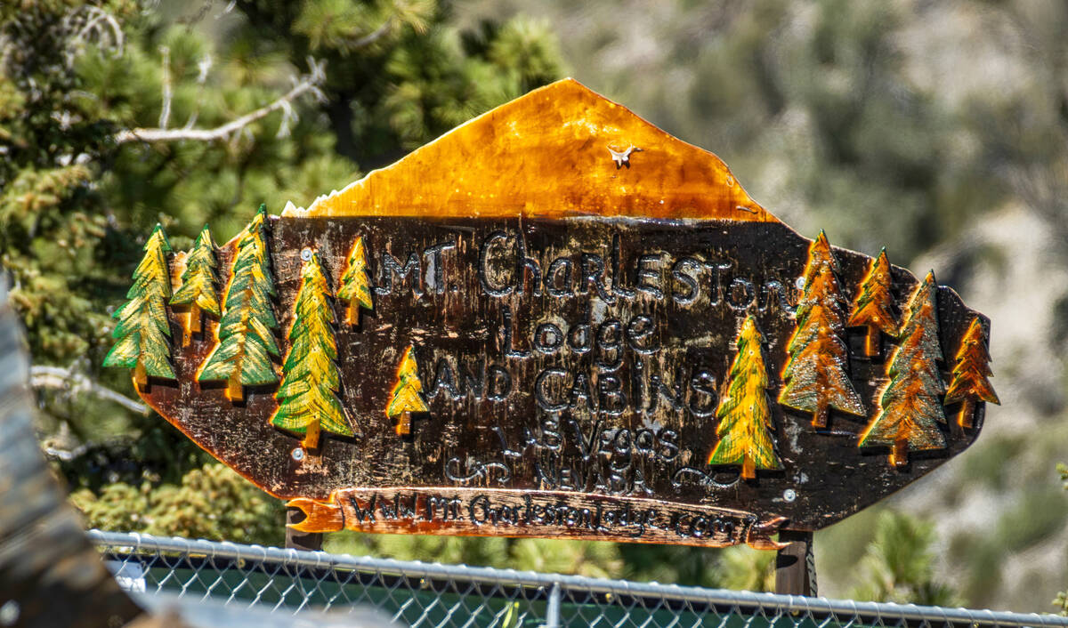 The burned remains of the Mount Charleston Lodge with iconic carved sign Wednesday, Sept. 22, 2 ...