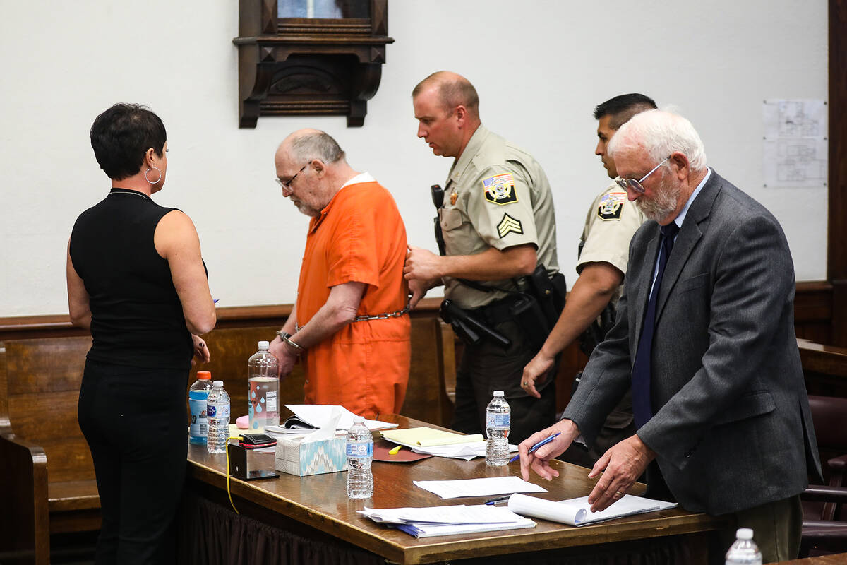 John Dabritz is led out of the courtroom after receiving a sentence of life in prison without t ...
