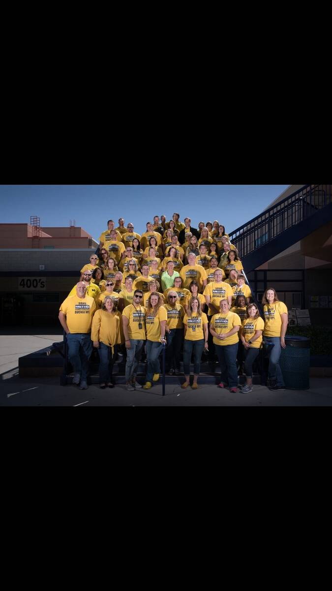 Shadow Ridge faculty members wear yellow in honor of Hillary LaVoie during a Yellow Out at the ...