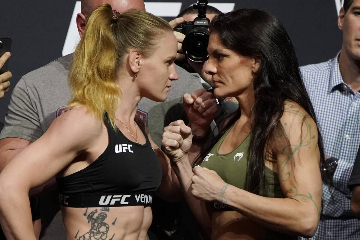 Valentina Shevchenko, left, and Lauren Murphy pose during a ceremonial weigh-in for a UFC 266 m ...