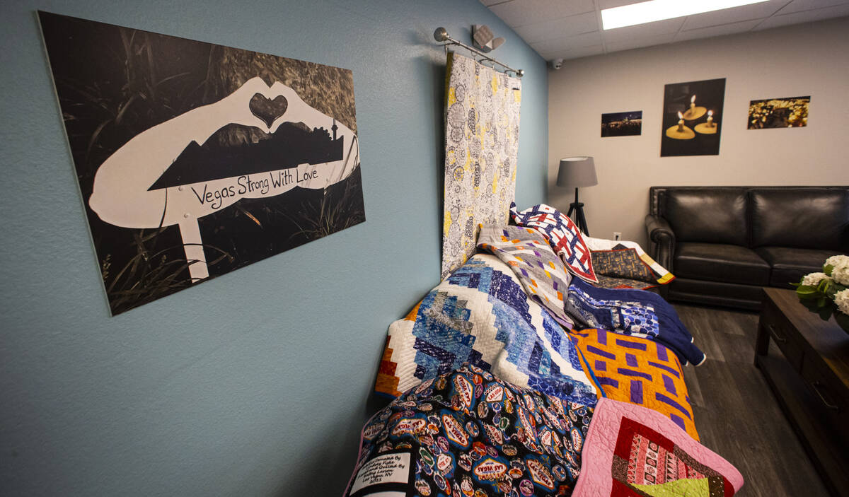 Donated quilts that will be given away to survivors, relatives and first responders affected in ...