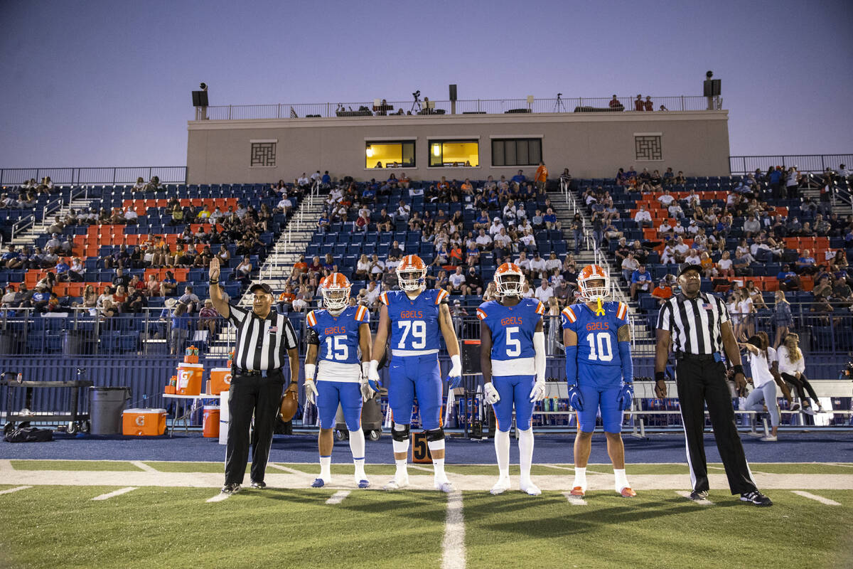 Bishop Gorman's Jeremiah-Joseph 'JJ' Bwire (15), Jake Taylor (79), Zion Branch (5) and Palaie F ...