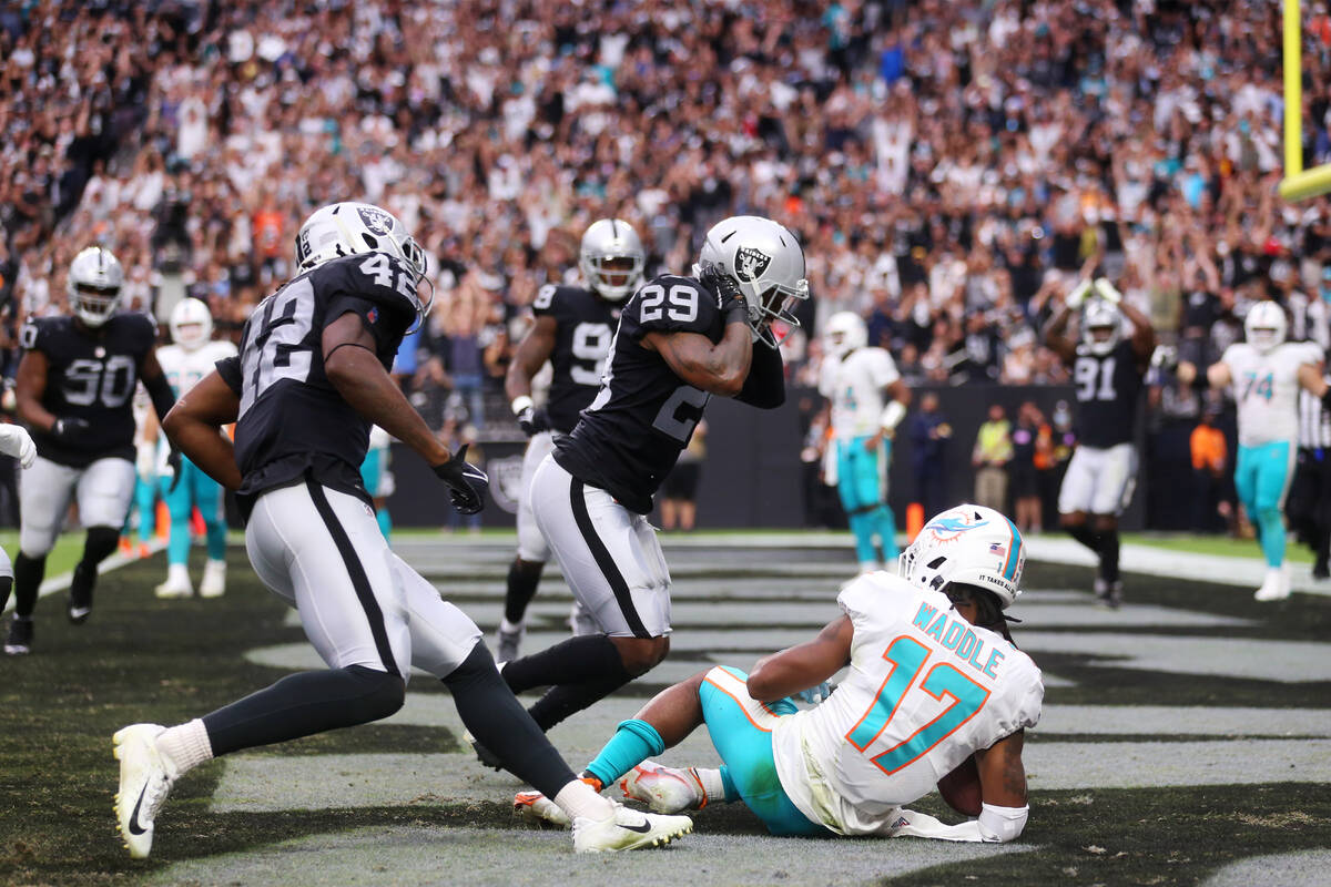 Las Vegas Raiders cornerback Casey Hayward (29) tackles Miami Dolphins wide receiver Jaylen Wad ...