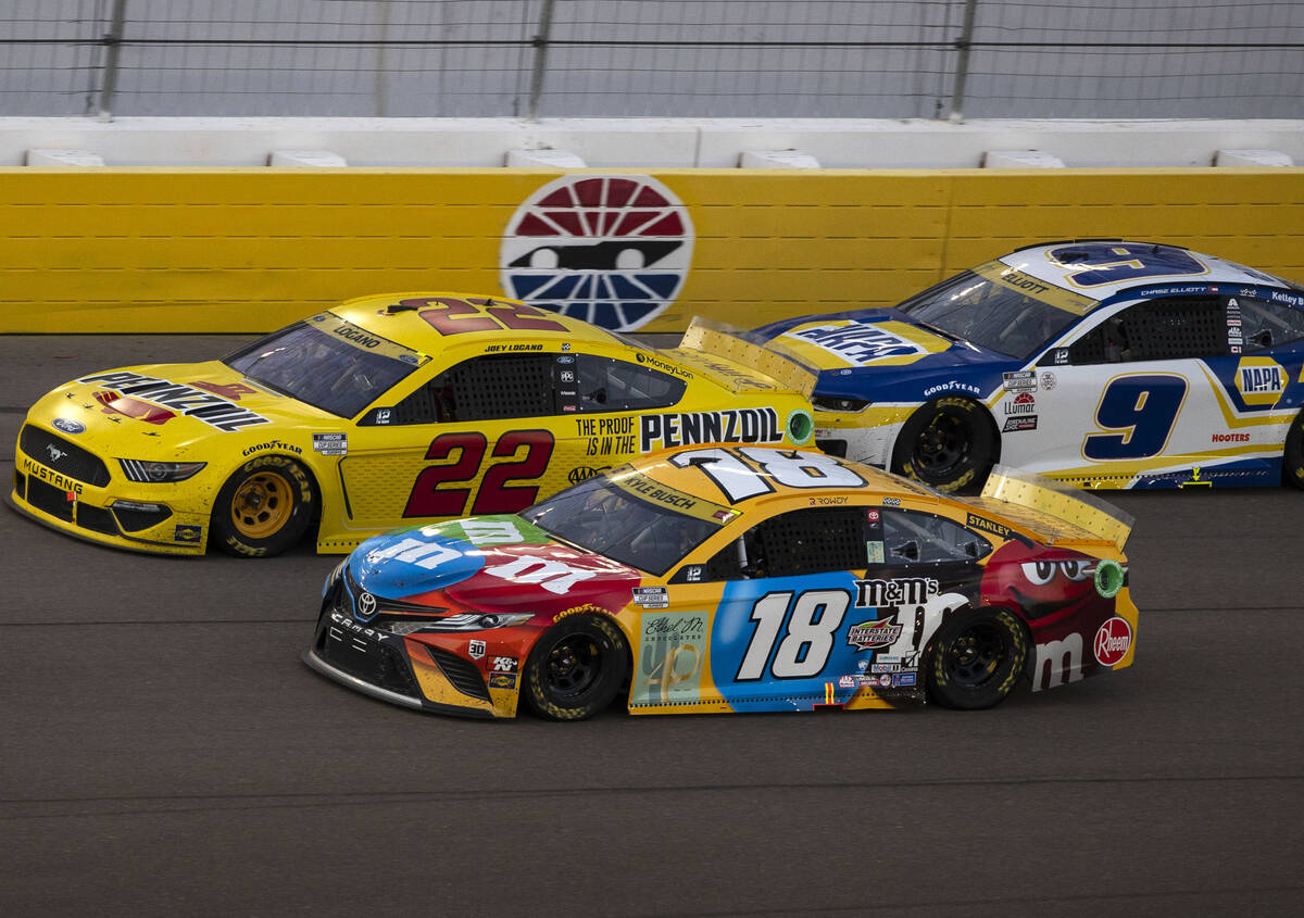 Kyle Busch (18) Joey Logano (22) and Chase Elliot (9) race during the 4th Annual South Point 40 ...