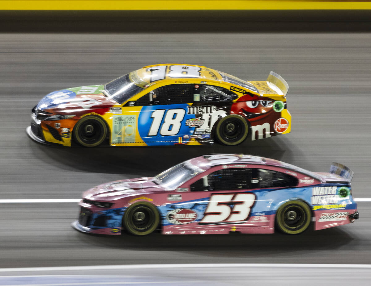 Kyle Busch (18) and Garrett Smithley (63) and Cody Ware (51) race during the 4th Annual South P ...