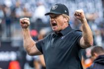 Raiders head coach Jon Gruden gets pumped up as the first half of their NFL game is set to begi ...