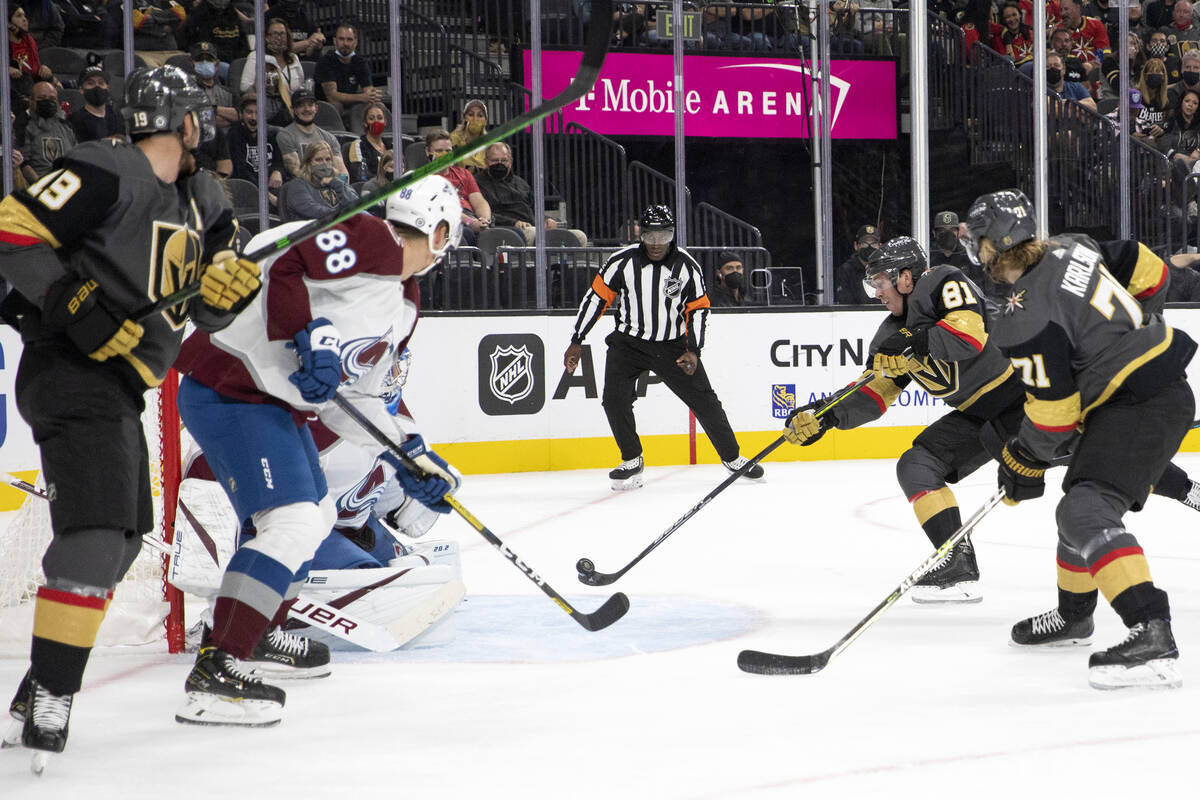 Golden Knights center Jonathan Marchessault (81) shoots to score a goal on Avalanche goaltender ...