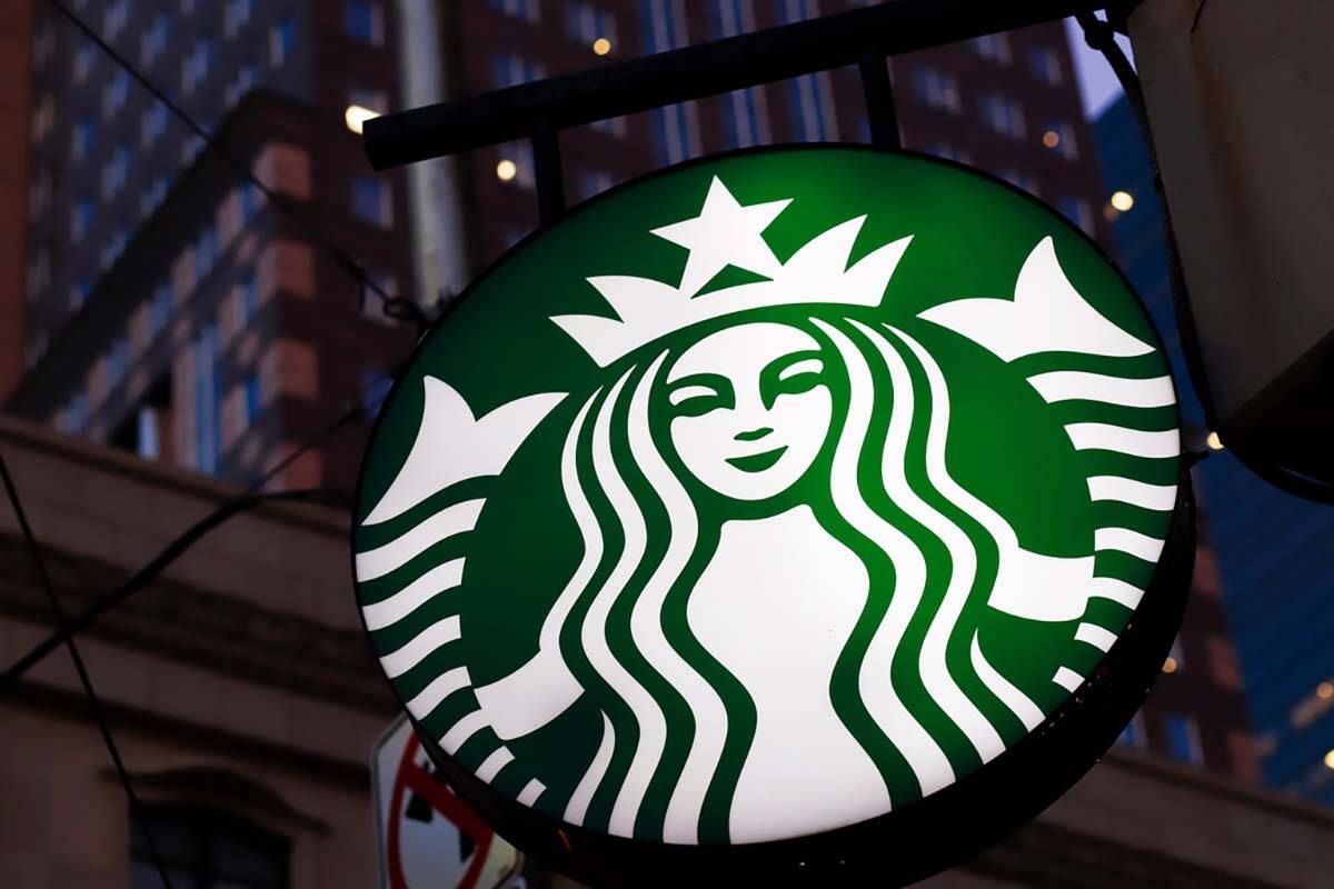 This June 26, 2019, photo shows a Starbucks sign outside a Starbucks coffee shop in downtown Pi ...