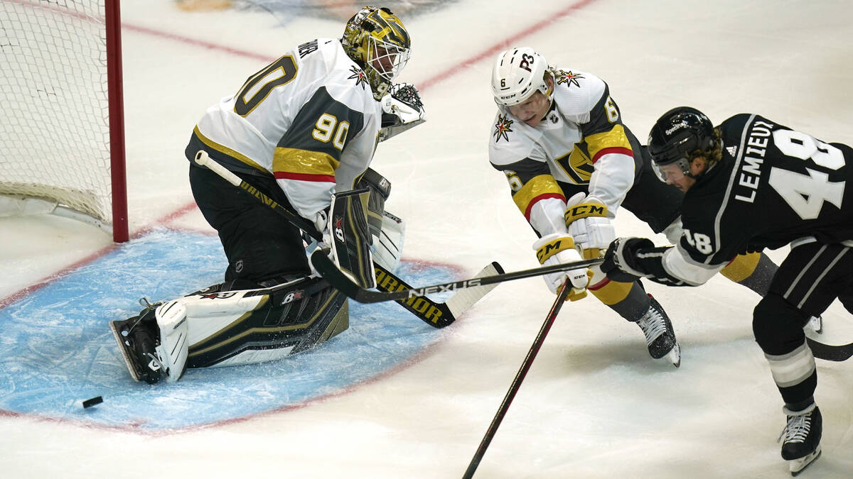 Los Angeles Kings left wing Brendan Lemieux (48) scores on Vegas Golden Knights goaltender Robi ...