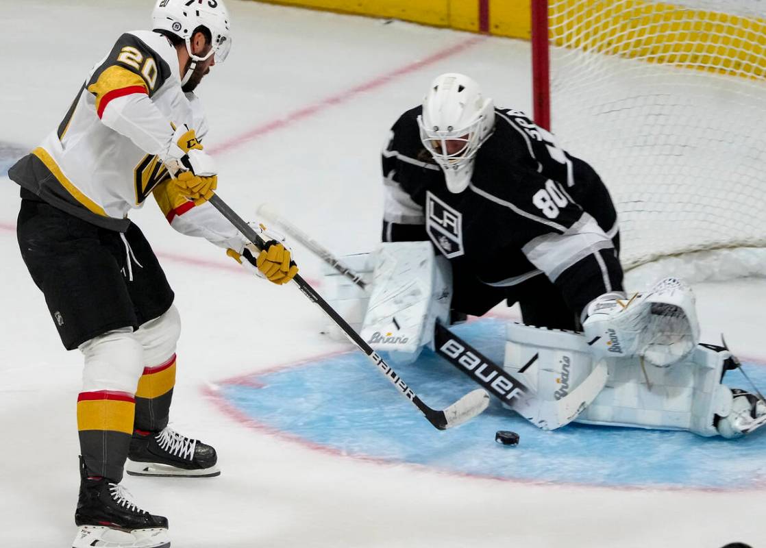 Los Angeles Kings goalie Garret Sparks (80) stops the shot of Vegas Golden Knights center Chand ...