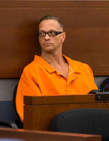 Death row inmate Scott Dozier appears before District Judge Jennifer Togliatti during a hearing ...