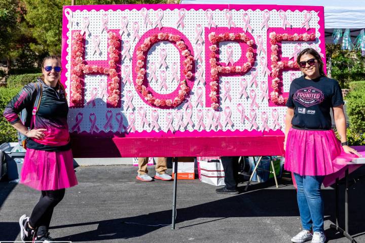 Samantha and Erick Molinero are shown with a Wall of Hope board, created to honor and remember ...