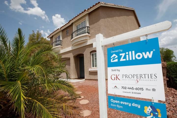 A sale sign is seen in front of a Zillow-owned house at 9992 Mills Reef Court in Las Vegas, Fri ...