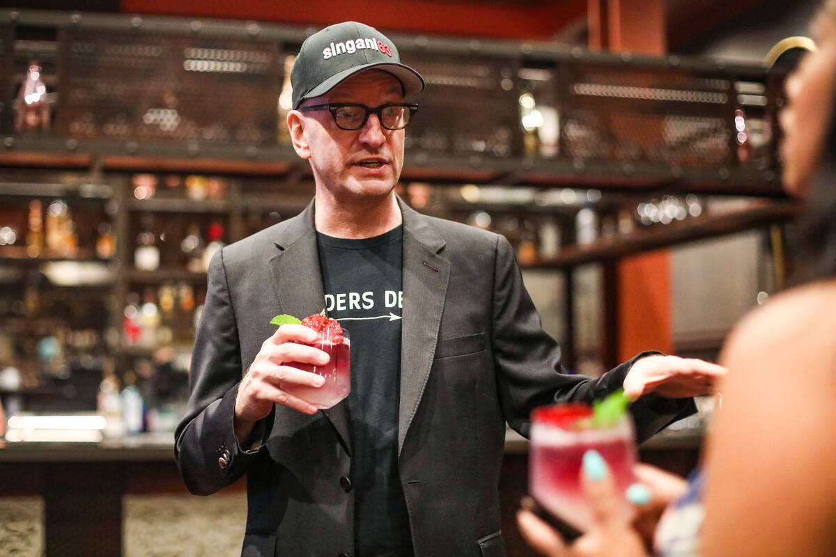 Oscar-winning director Steven Soderbergh talks with a local bartender while promoting the liquo ...