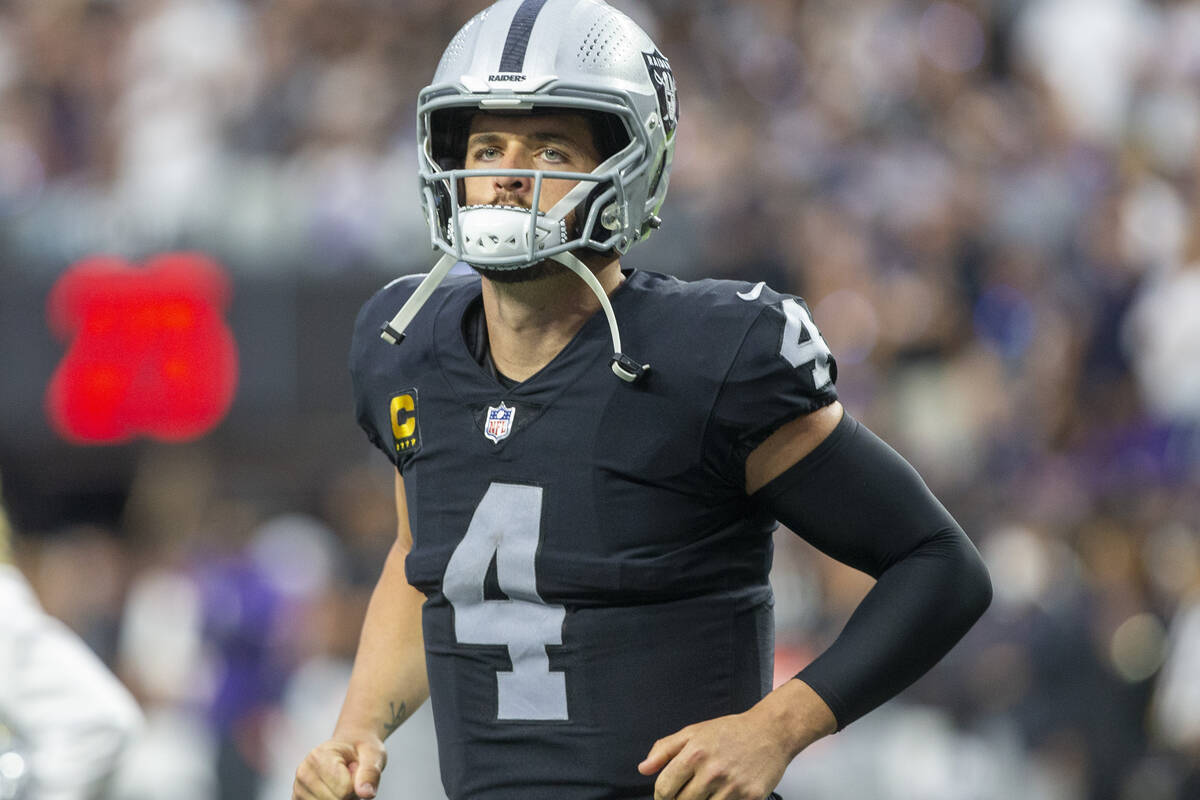 Raiders quarterback Derek Carr (4) takes the field before an NFL football game against the Balt ...