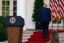 President Donald Trump walks off after speaking during a news conference in the Rose Garden of ...