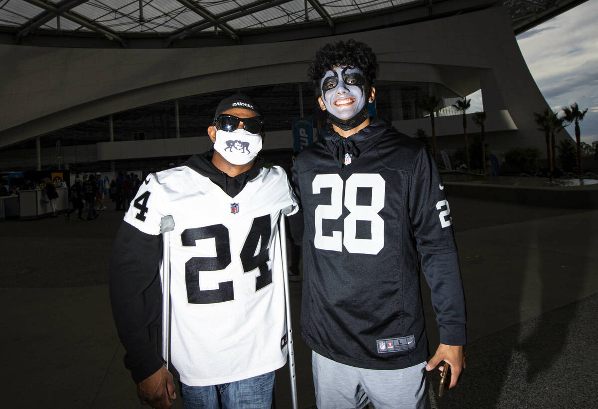 Brothers Anthony Robles, left, and Andrew Robles, both from Arizona, pose for a picture at SoFi ...
