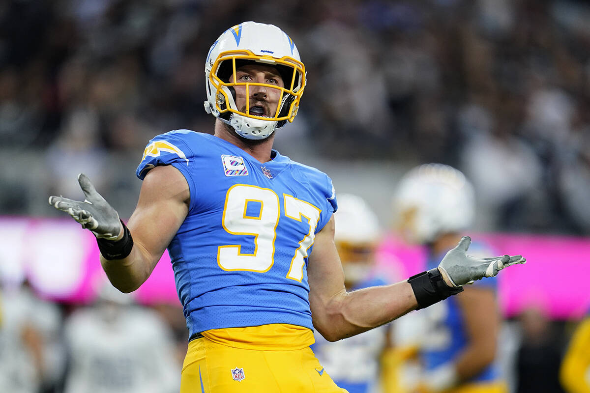 Los Angeles Chargers defensive end Joey Bosa reacts after sacking Las Vegas Raiders quarterback ...