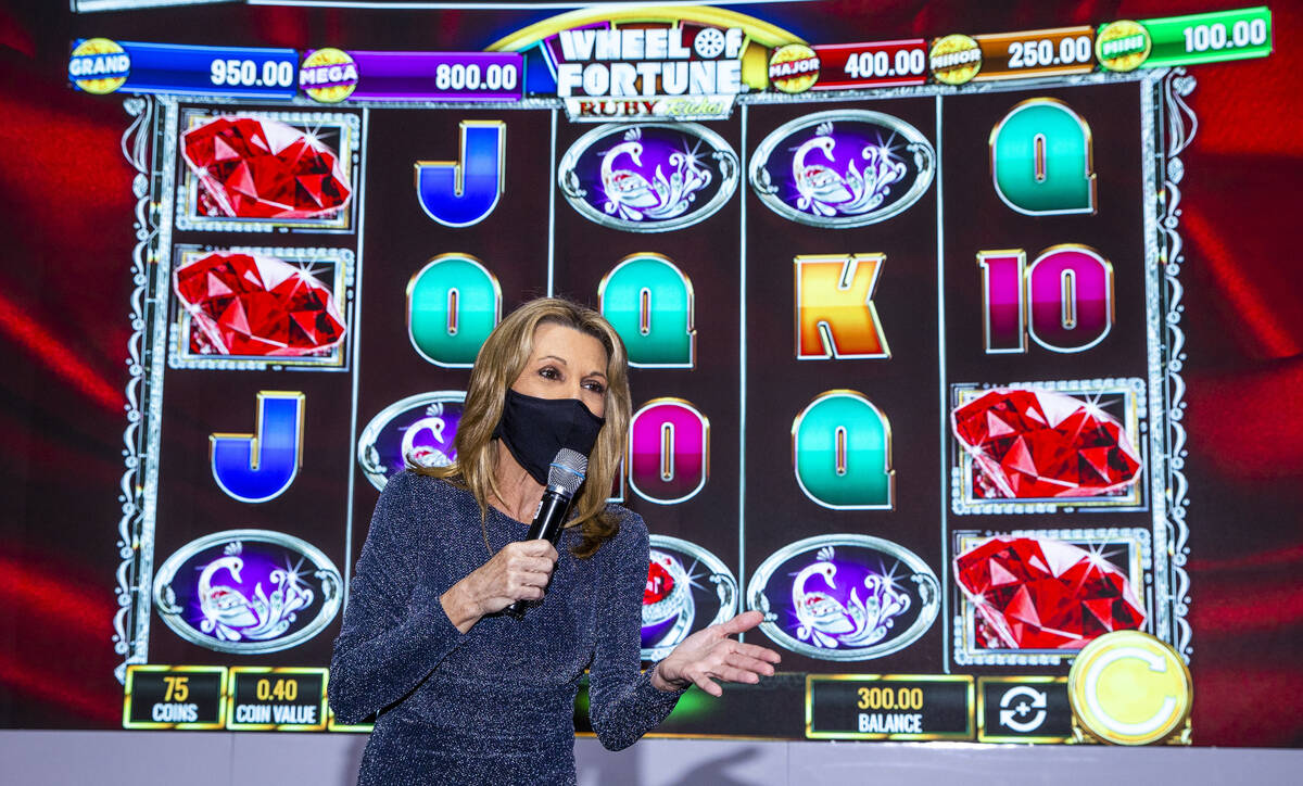 Wheel of Fortune competition host Vanna White introduces the online game in the IGT display spa ...
