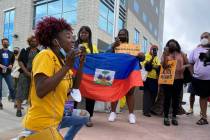 Santcha Etienne, Florida organizer for the Black Alliance for Just Immigration, speaks during a ...