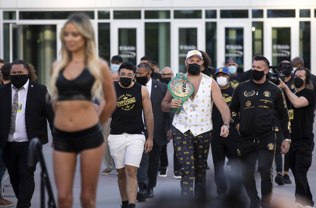 WBC heavyweight champion Tyson Fury and his entourage arrive to a press conference at Toshiba P ...