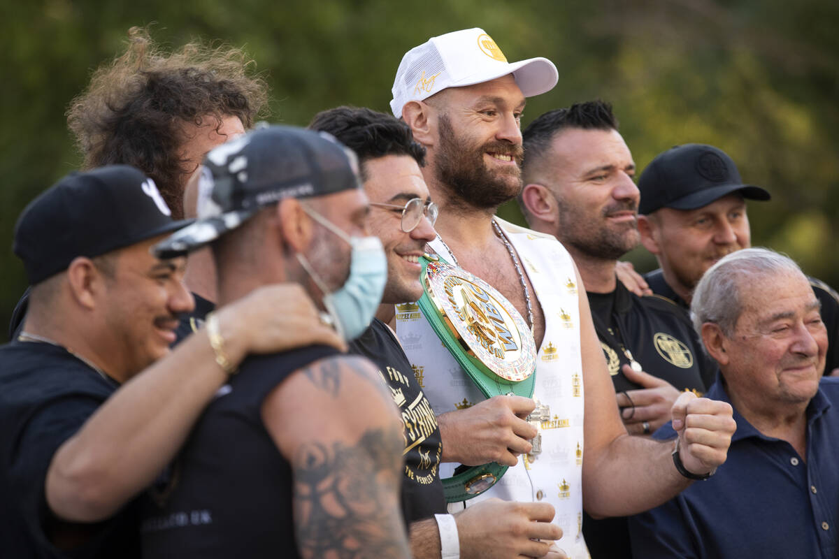 WBC heavyweight champion Tyson Fury poses for photos after a press conference at Toshiba Plaza ...