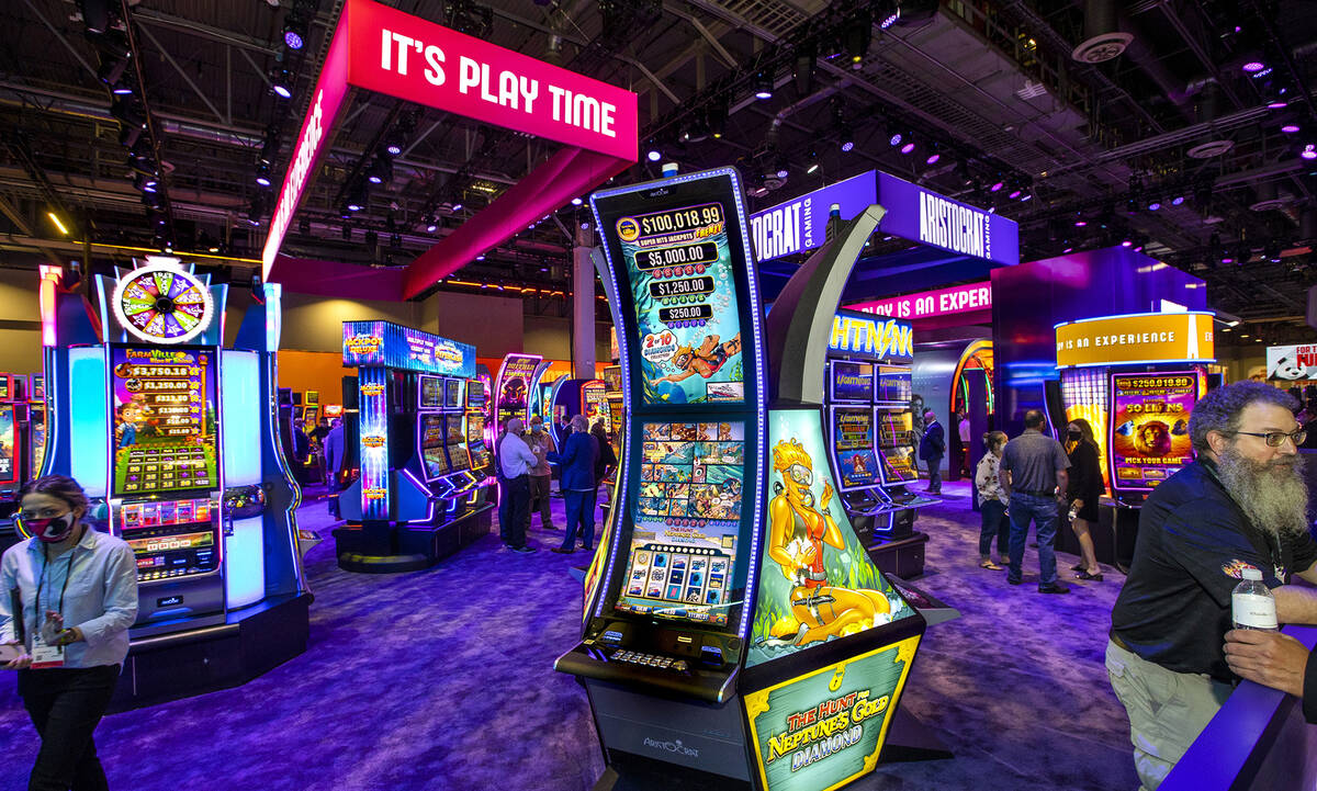 A wide variety of slots are ready for the play within the Aristocrat Gaming display area during ...