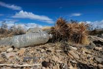 An empty water bottle in a vacant field on Saturday, Oct. 9, 2021, in Las Vegas. (Benjamin Hage ...