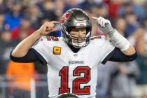 Tampa Bay Buccaneers quarterback Tom Brady (12) makes an adjustment at the line of scrimmage du ...