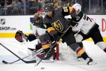 Golden Knights right wing Keegan Kolesar (55) attempts to score a goal while Coyotes goaltender ...