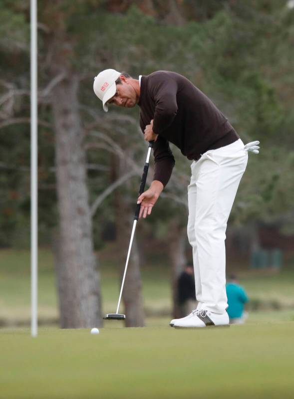 Adam Scott putts on the 10th green during the first round of the Shriners Hospitals for Childre ...