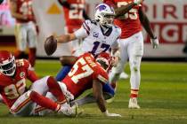 Buffalo Bills quarterback Josh Allen (17) is sacked by Kansas City Chiefs defensive end Alex Ok ...