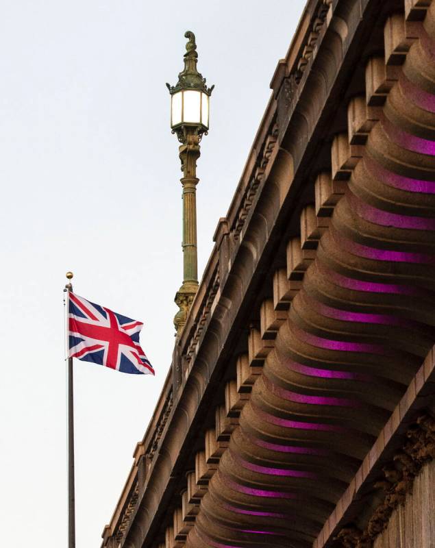 A British flag flies high above the London Bridge on Saturday, Oct. 2, 2021, in Lake Havasu, Ar ...