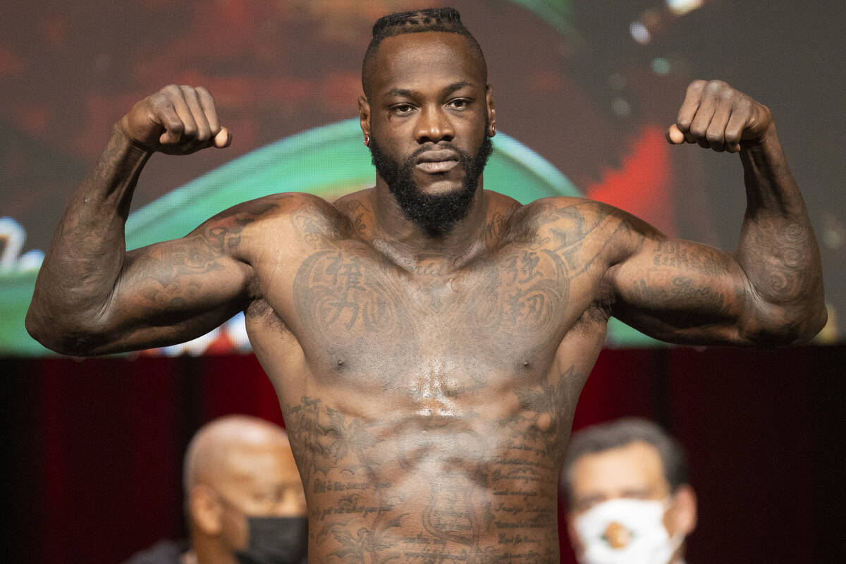 Deontay Wilder poses during a weigh-in event at the MGM Grand Garden Arena in Las Vegas, Friday ...