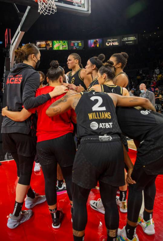 Las Vegas Aces players share an emotional moment at the Michelob Ultra Arena after losing Game ...