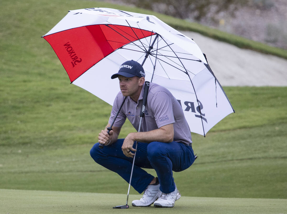 Jared Wolfe of Ponte Verde, Fla., lines up a putt at the 10th hole during the second round of t ...