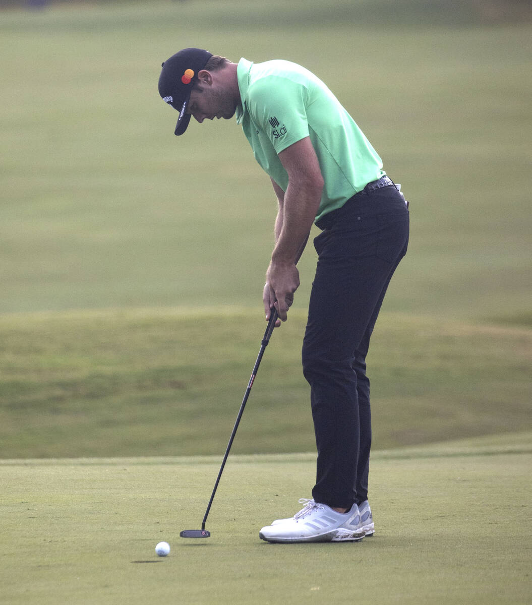 Sam Burns of Shreveport, La., makes his putt on the 18th hole during the second round of the Sh ...