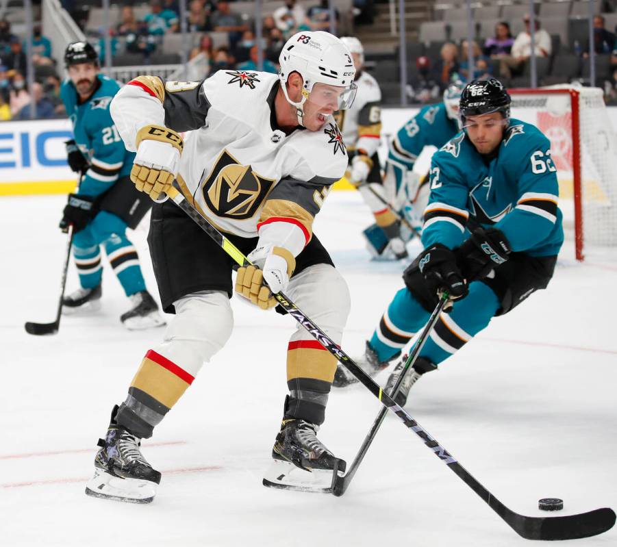 Vegas Golden Knights defenseman Brayden McNabb (3) battles for the puck against San Jose Sharks ...