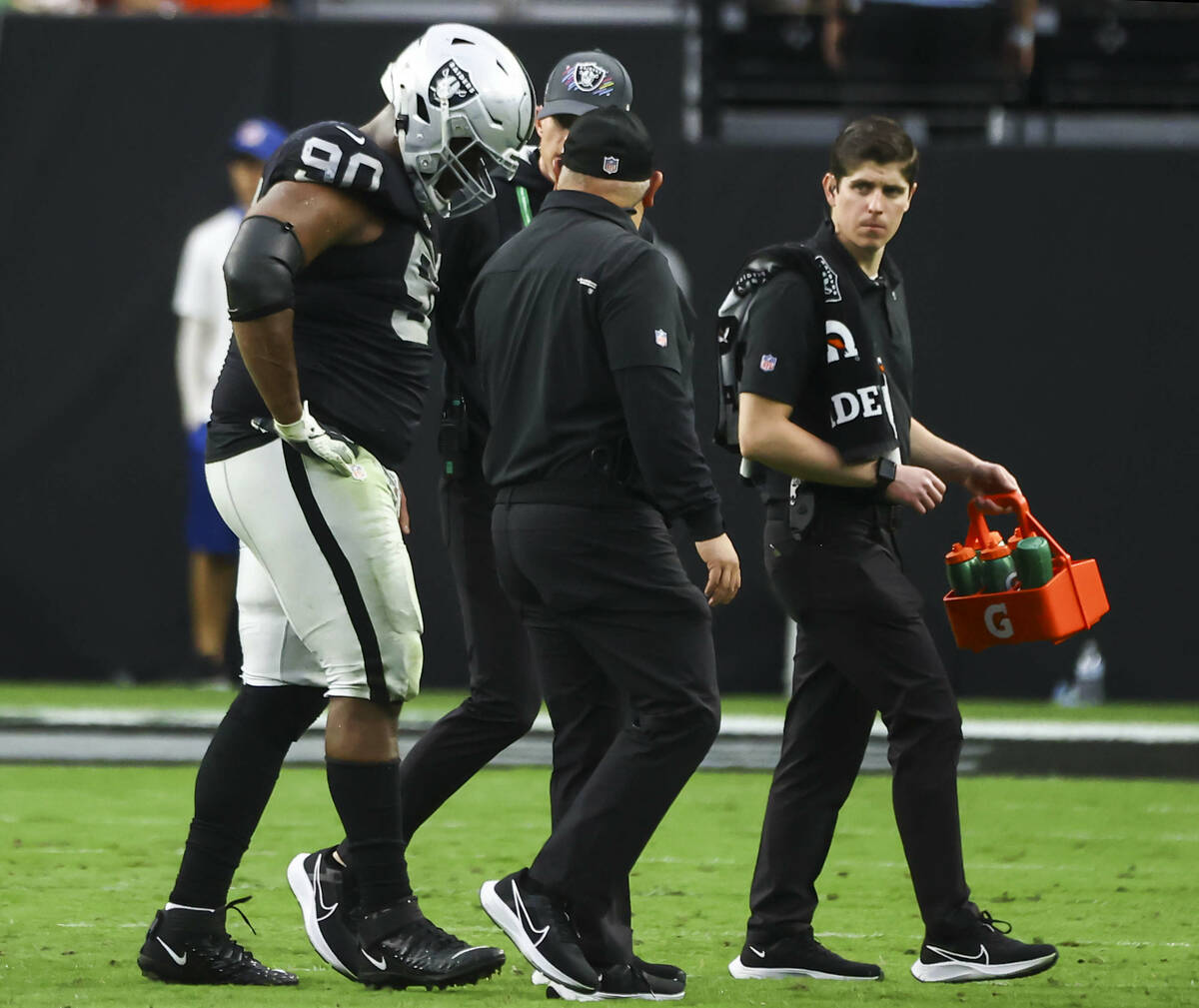 Raiders defensive tackle Johnathan Hankins (90) walks off the field after an injury during the ...