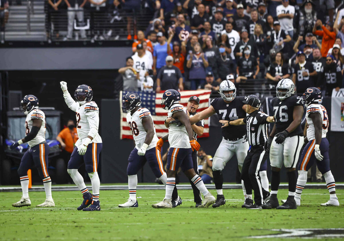 The Chicago Bears celebrate after a fourth down stop against the Raiders during the first half ...