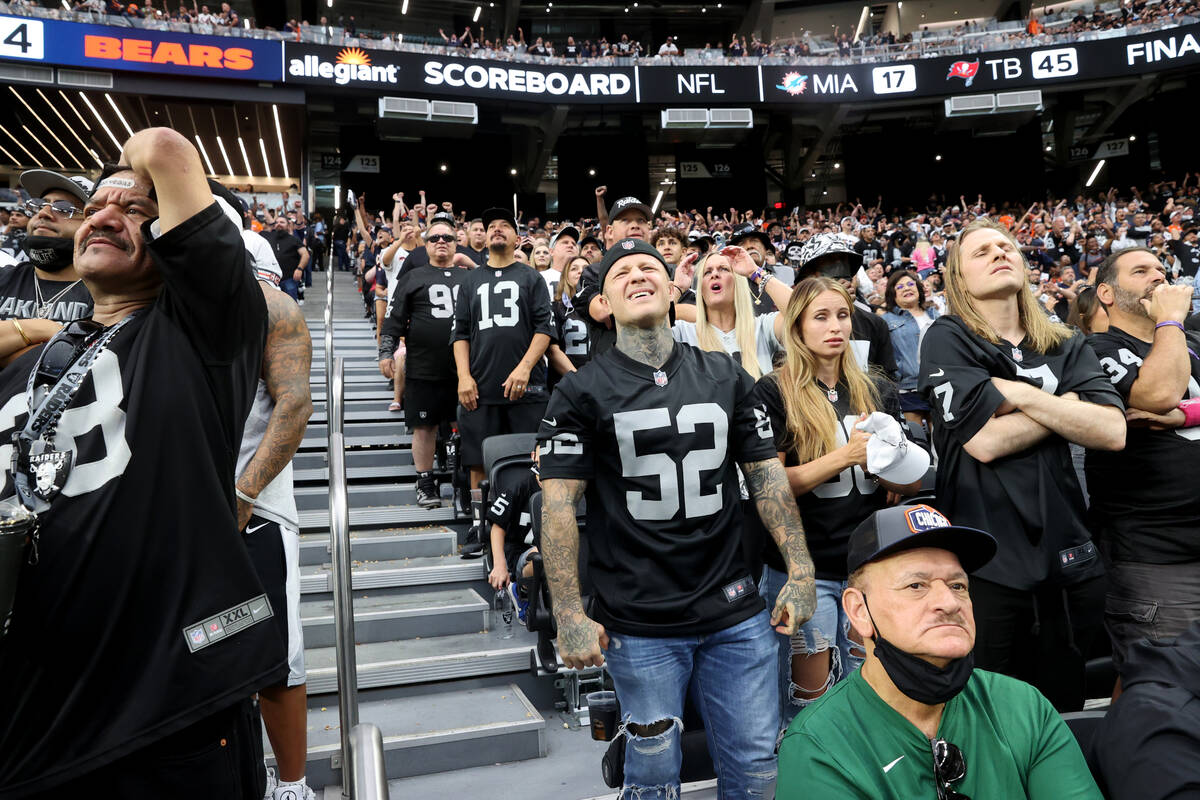 Fans, including Johnny Flores of Fontana, Calif., left, and Robert Pearlman of Newport Beach, r ...