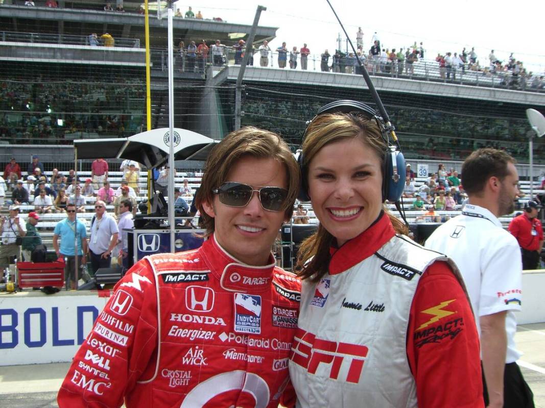 Dan Wheldon, left, and pit road reporter and Green Valley High graduate Jamie Little share a mo ...