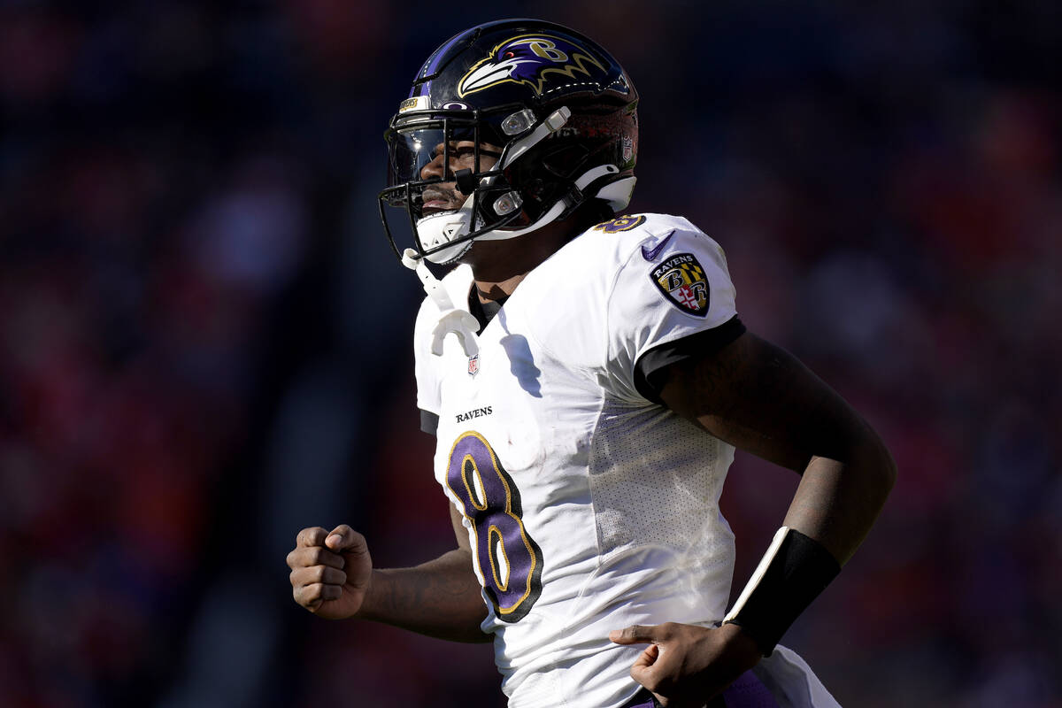 Baltimore Ravens quarterback Lamar Jackson (8) takes the field during the second half of an NFL ...