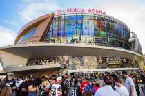 Fans wait to enter T-Mobile Arena before the start of Game 7 of an NHL Stanley Cup first-round ...