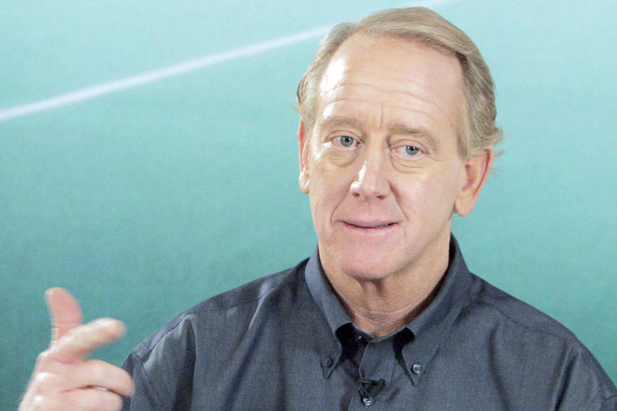 Archie Manning answers questions after the taping of a DirecTV commercial in Beverly Hills, Cal ...